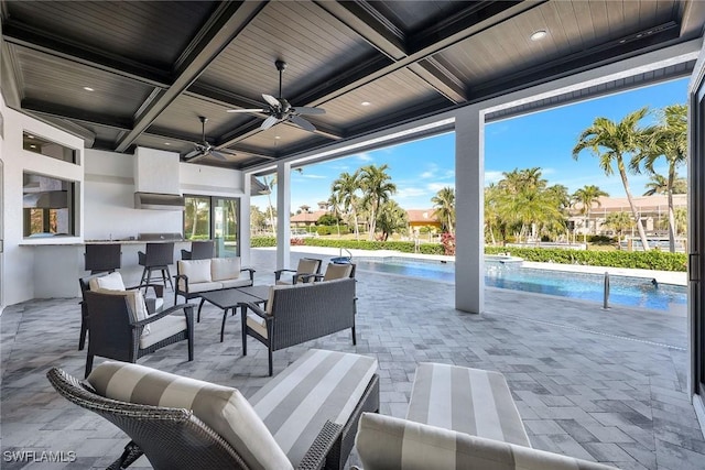 view of patio / terrace featuring an outdoor living space and ceiling fan