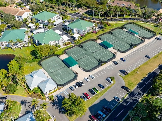 aerial view with a water view and a residential view