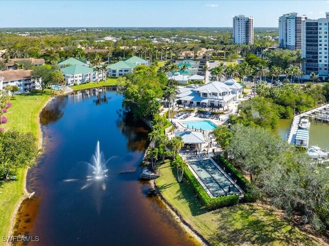 birds eye view of property featuring a water view