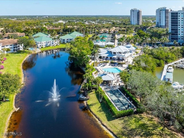 bird's eye view with a water view