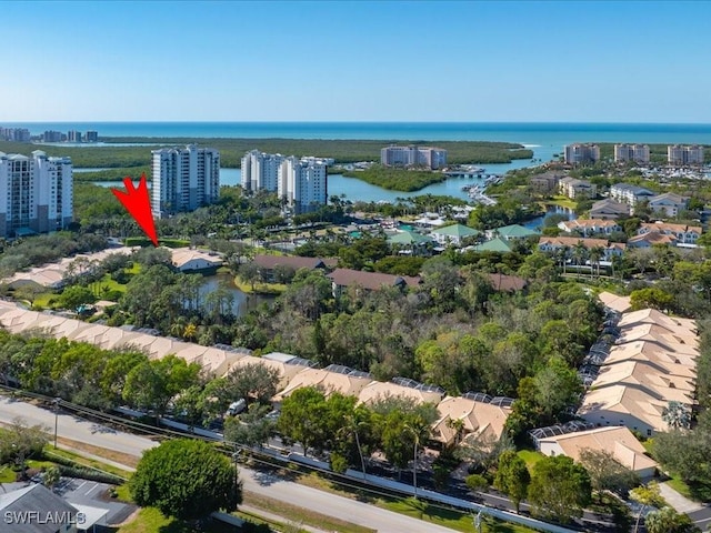 aerial view with a water view and a city view