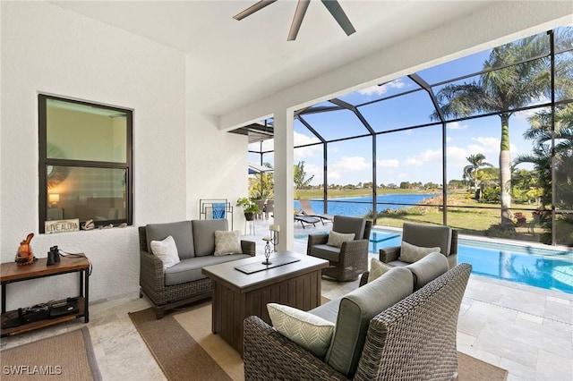 view of patio / terrace featuring glass enclosure, a water view, and an outdoor hangout area