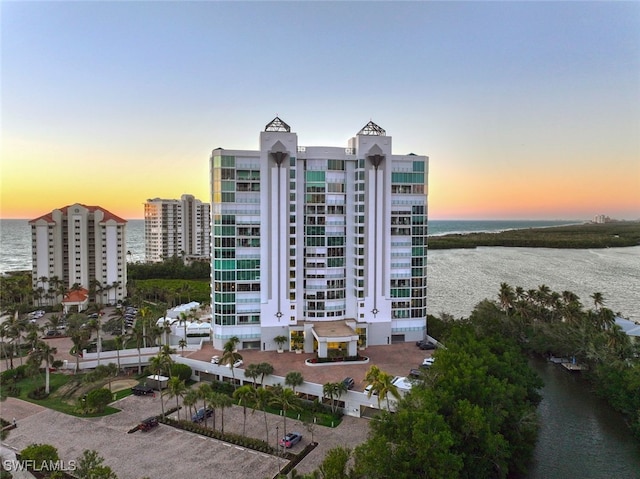 outdoor building at dusk with a water view