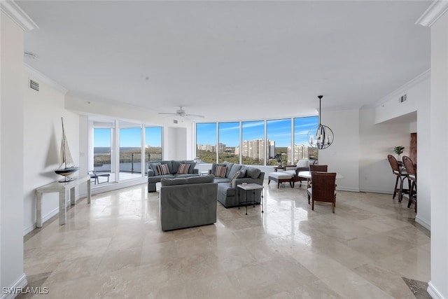 living room featuring visible vents, a wall of windows, baseboards, and ornamental molding