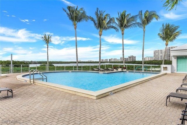 view of pool featuring a patio