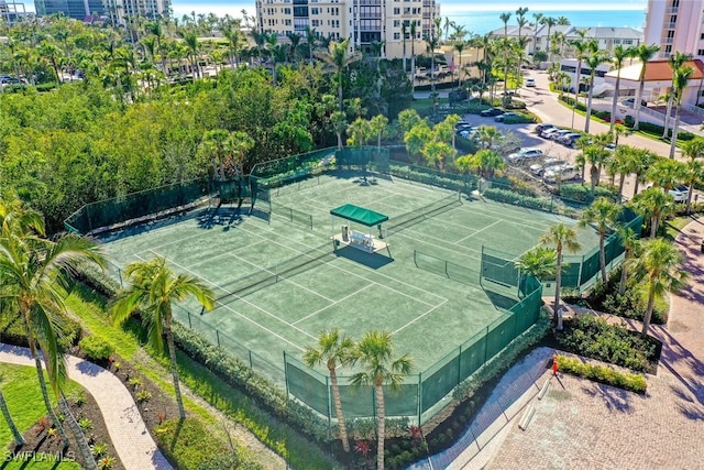 view of sport court with fence