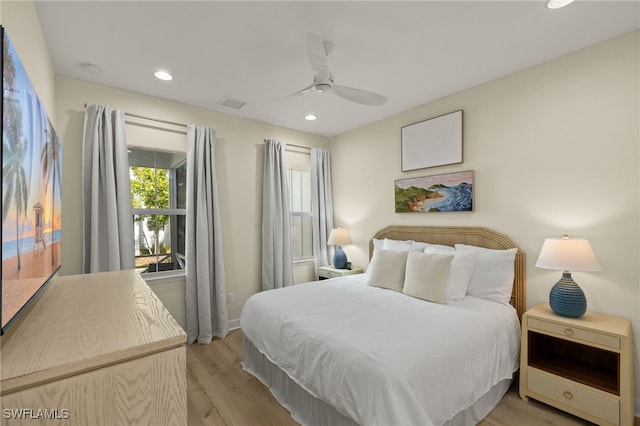 bedroom featuring ceiling fan and light wood-type flooring