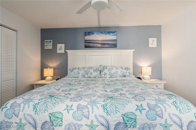 5600 Bonita Beach Rd Unit 508, Bonita Springs, FL 34134 - bedroom featuring a closet, a textured ceiling, and ceiling fan