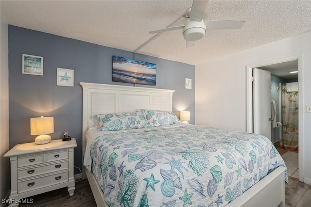 5600 Bonita Beach Rd Unit 508, Bonita Springs, FL 34134 - bedroom with a ceiling fan, a textured ceiling, and wood finished floors