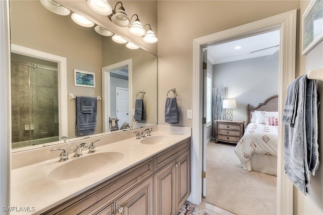 bathroom featuring crown molding and vanity