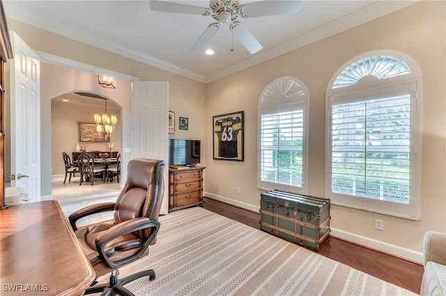 office area with ceiling fan with notable chandelier, ornamental molding, and hardwood / wood-style flooring