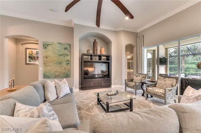 living room with beam ceiling and ceiling fan