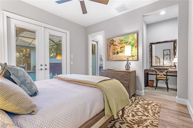 bedroom featuring light wood-type flooring, ceiling fan, access to exterior, and french doors