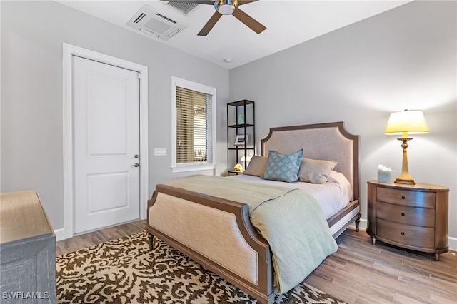 bedroom featuring ceiling fan and light hardwood / wood-style flooring