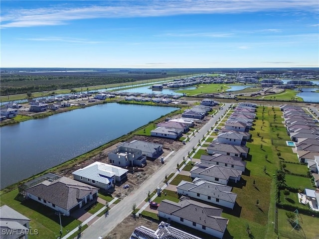 drone / aerial view with a water view