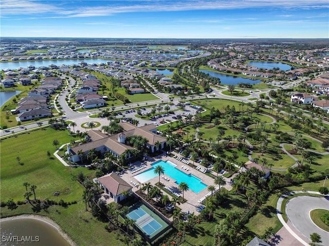 birds eye view of property featuring a water view