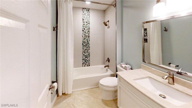 full bathroom featuring toilet, vanity, and shower / bath combo