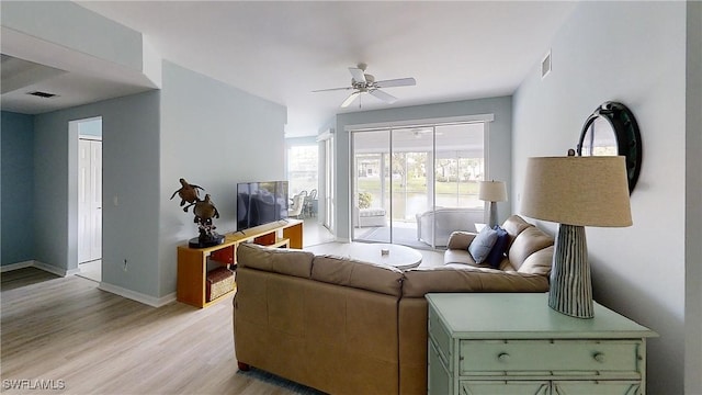 2135 Arielle Dr Unit 2407, Naples, FL 34109 - living room featuring ceiling fan and light wood-style floors