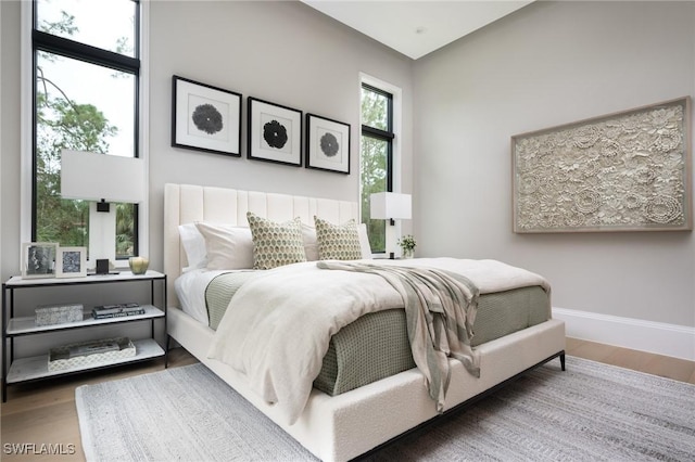 bedroom featuring hardwood / wood-style floors