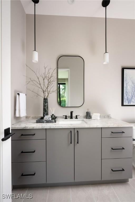 bathroom featuring tile patterned floors and vanity