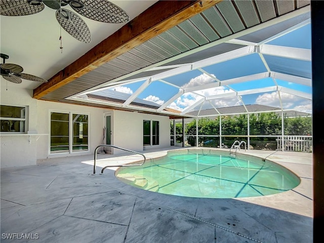 view of pool with a patio area, a lanai, and ceiling fan