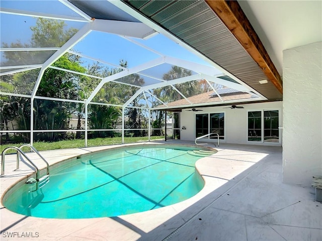 view of pool with a patio area, a lanai, and ceiling fan