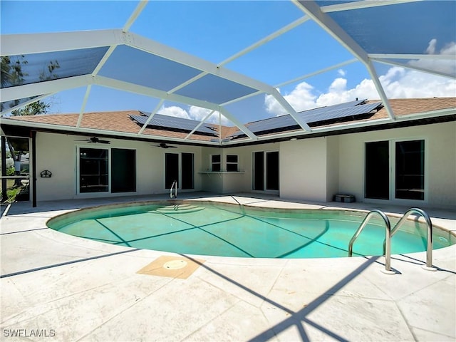 view of pool with a lanai and a patio