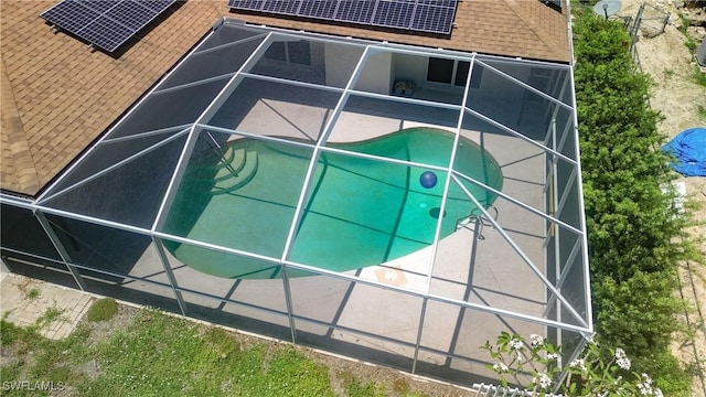 view of home's exterior with solar panels