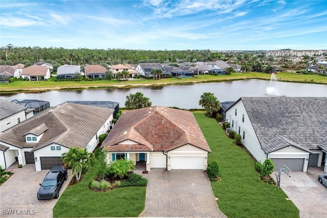 bird's eye view with a water view