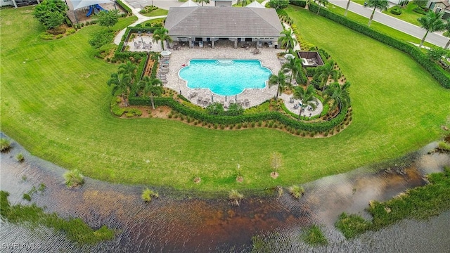 birds eye view of property featuring a water view