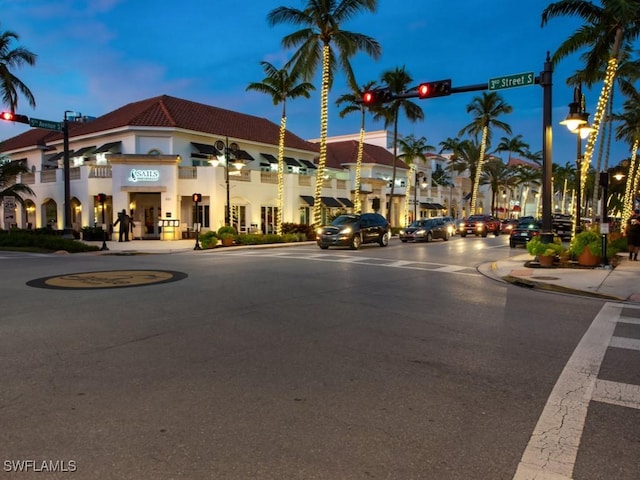 view of outdoor building at dusk