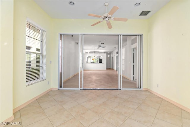 interior space featuring ceiling fan