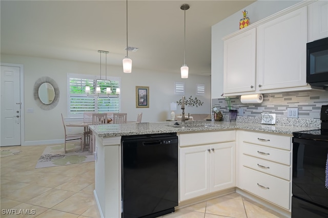 kitchen featuring tasteful backsplash, white cabinets, pendant lighting, light tile patterned flooring, and black appliances