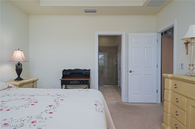 carpeted bedroom featuring a closet