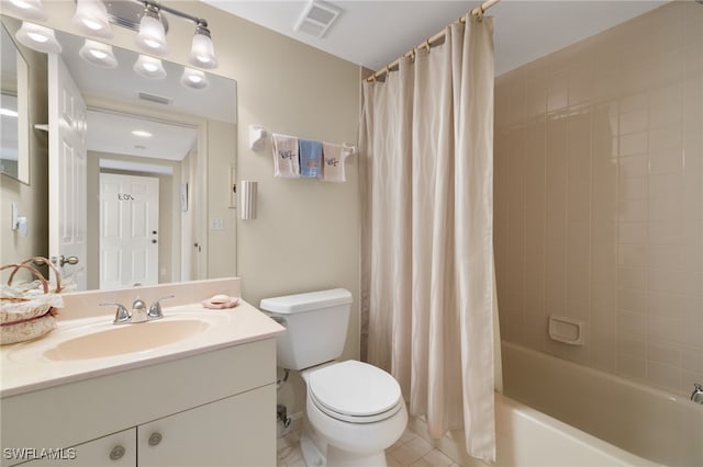 full bathroom featuring shower / tub combo with curtain, vanity, and toilet