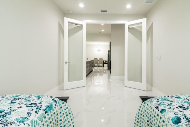 bedroom with marble finish floor, baseboards, visible vents, and recessed lighting