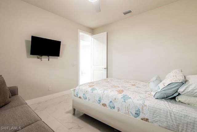 bedroom featuring marble finish floor, baseboards, visible vents, and ceiling fan