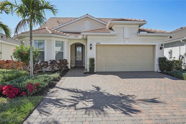 view of front of home with a garage