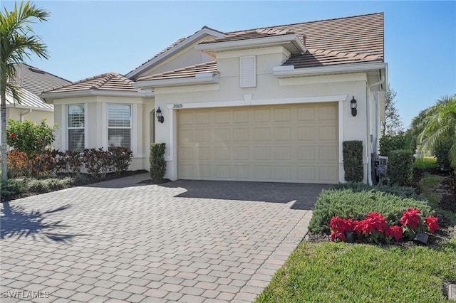 view of front of home with a garage