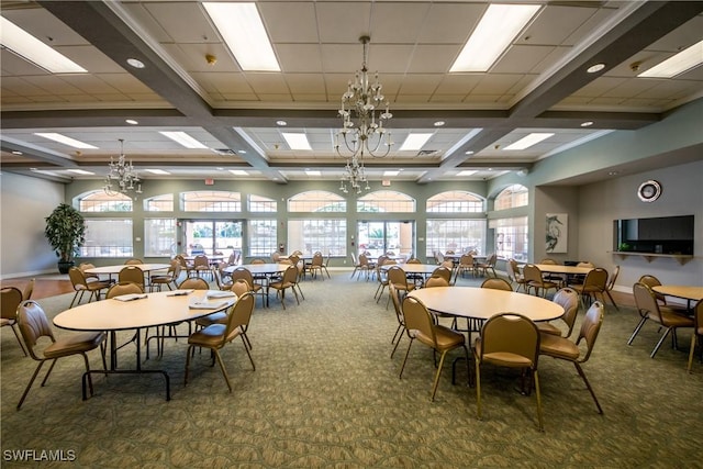 carpeted dining room with beam ceiling, a chandelier, and coffered ceiling