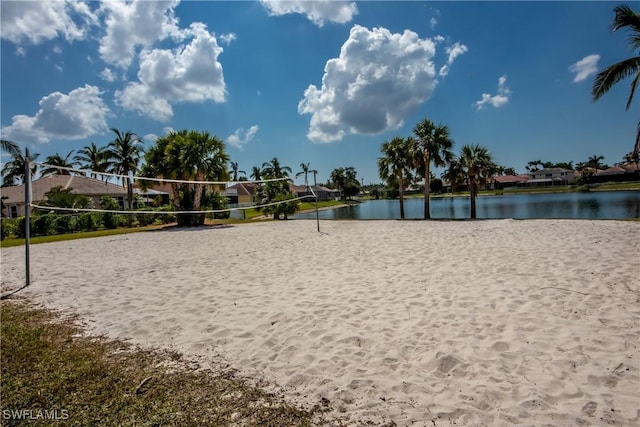 view of property's community featuring a water view and volleyball court