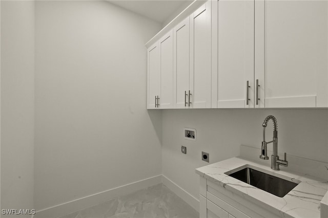 laundry room with electric dryer hookup, cabinets, washer hookup, and sink