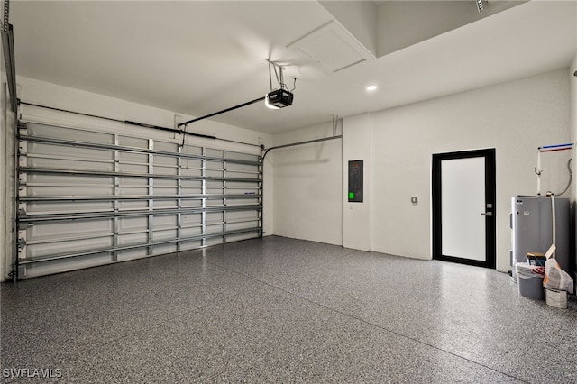 garage featuring water heater, a garage door opener, and electric panel