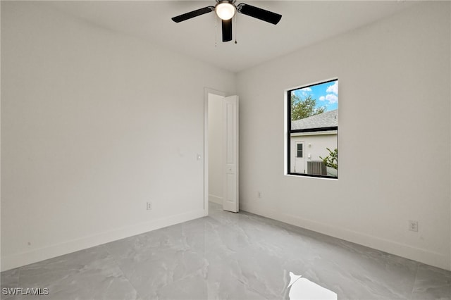 unfurnished room featuring ceiling fan