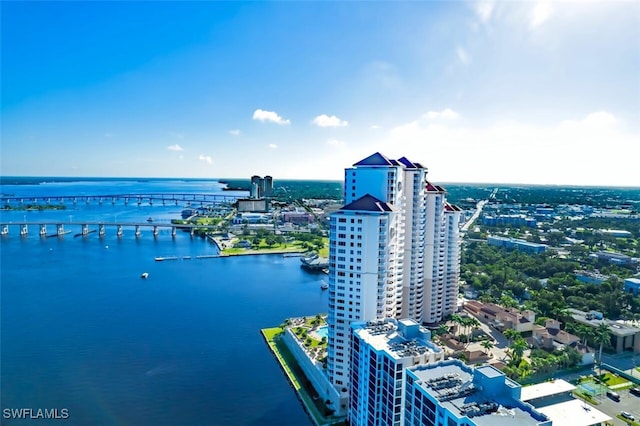 aerial view featuring a view of city and a water view
