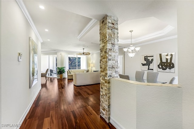 corridor with ornate columns, recessed lighting, wood-type flooring, and crown molding