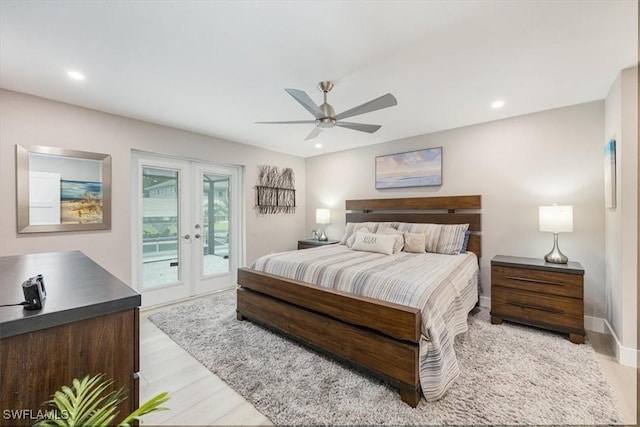 bedroom with ceiling fan, access to exterior, french doors, and light wood-type flooring