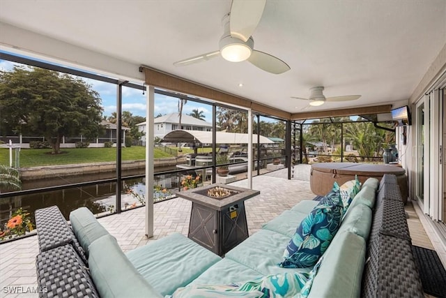 sunroom / solarium with ceiling fan