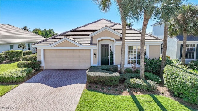 view of front of property featuring a garage