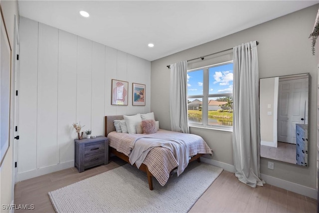 bedroom featuring light wood-type flooring